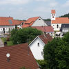 Bild vergrößern: Ringschnait - Blick aus südlicher Richtung auf die Gaststätte d' Adler und Kirche Mariä Himmelfahrt